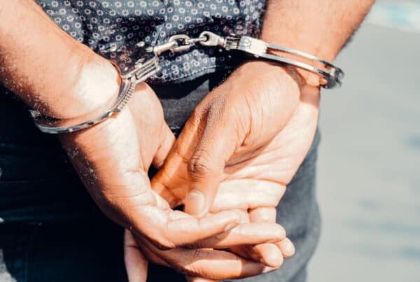 Photo by Kindel Media: https://www.pexels.com/photo/close-up-photography-of-person-in-handcuffs-7714892/