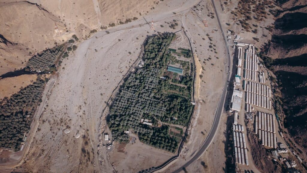 Photo by Eslam Mohammed Abdelmaksoud: https://www.pexels.com/photo/aerial-view-of-farm-in-the-oman-desert-landscape-36099463/